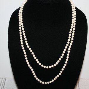 Beautiful vintage cream beaded necklace 48"